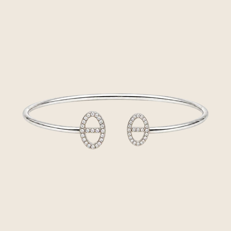 Athena Armreif in Silber, offen und verstellbar, mit zwei ovalen Pavé-Enden aus Zirkonia