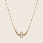Filigrane Clara Halskette aus 14k vergoldetem Edelstahl mit Kleeblatt-Motiv und Zirkonia-Besatz.