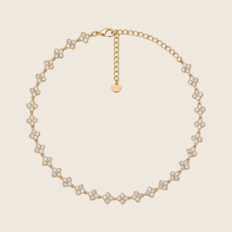Crystal Bloom Halskette aus 14k vergoldetem Edelstahl mit klaren Zirkonia-Blüten.