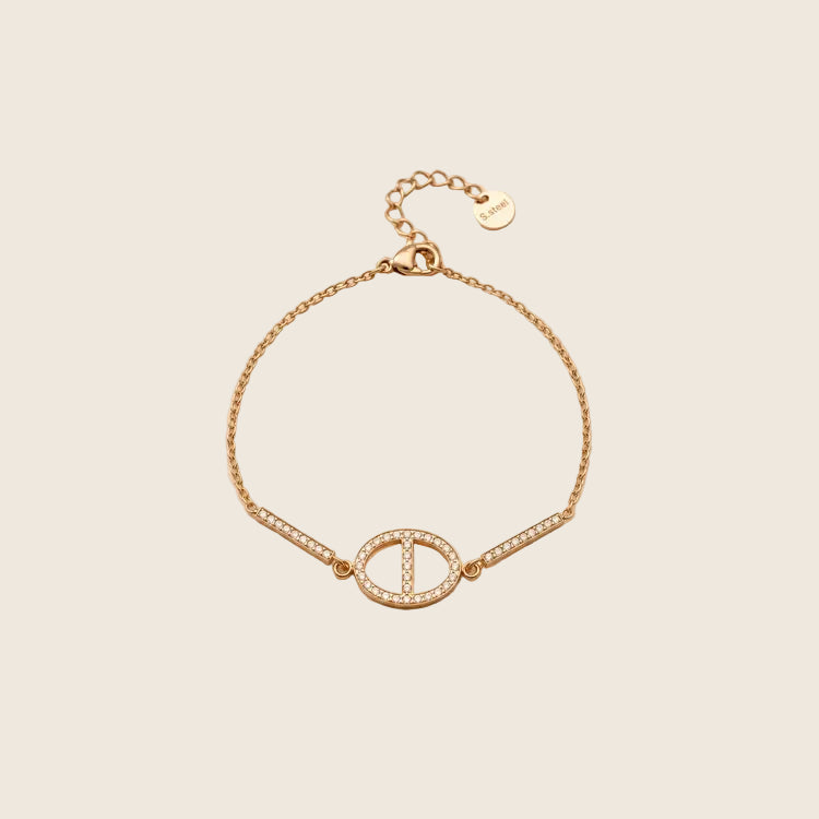 Dolce Armband in Gold mit ovalem Pavé-Glied, zwei Zirkonia-Stäben und Verlängerungskette