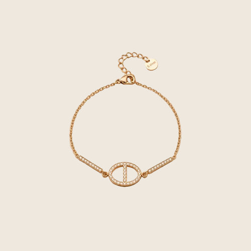 Dolce Armband in Gold mit ovalem Pavé-Glied, zwei Zirkonia-Stäben und Verlängerungskette