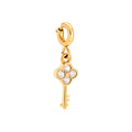 Goldener Schlüssel-Charm "Key to my Heart" aus 14k vergoldetem Edelstahl mit vier funkelnden Zirkonia-Steinen und Klick-Verschluss vor weißem Hintergrund.
