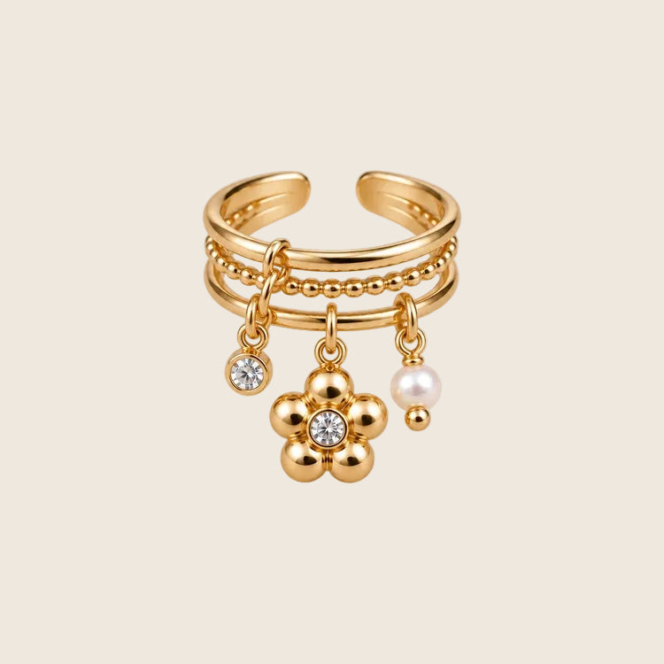 Jolie Ring in Gold, dreireihig, mit Zirkonia-Blüte, Stein und Perle als Anhänger