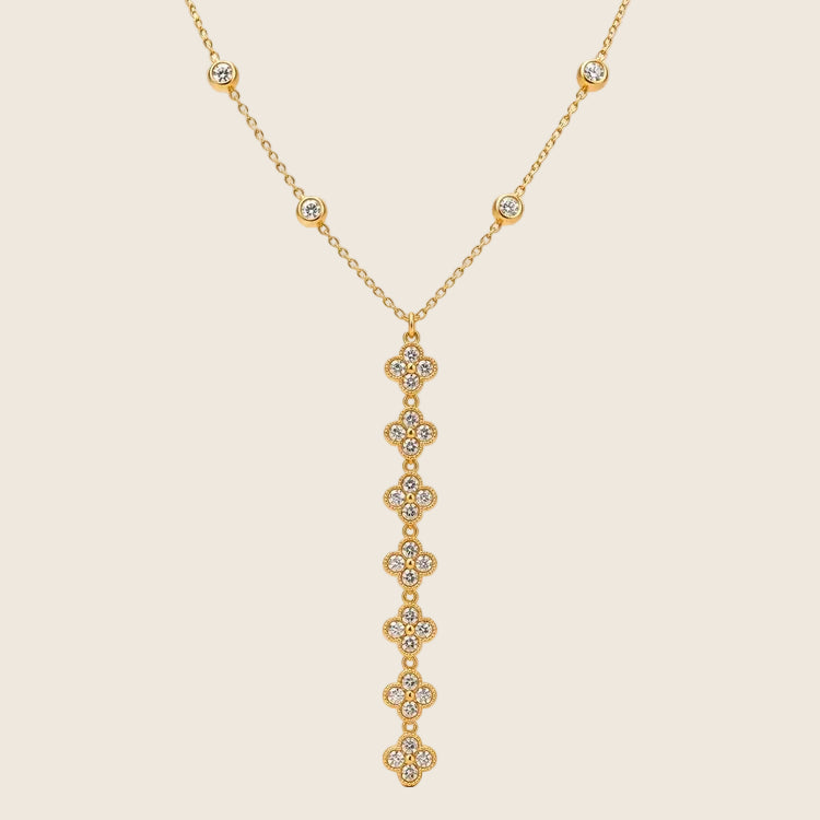 Nymea Y-Halskette in Gold mit sieben Kleeblättern und Zirkonia-Steinen, Edelstahl 14k vergoldet